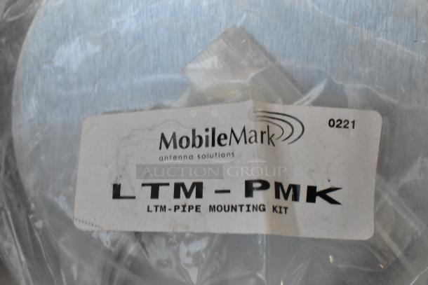 4 brand new MobileMark LTM-PMK heavy-duty pole/wall mounting brackets in original packaging, label indicates LTM-Pipe Mounting Kit.
