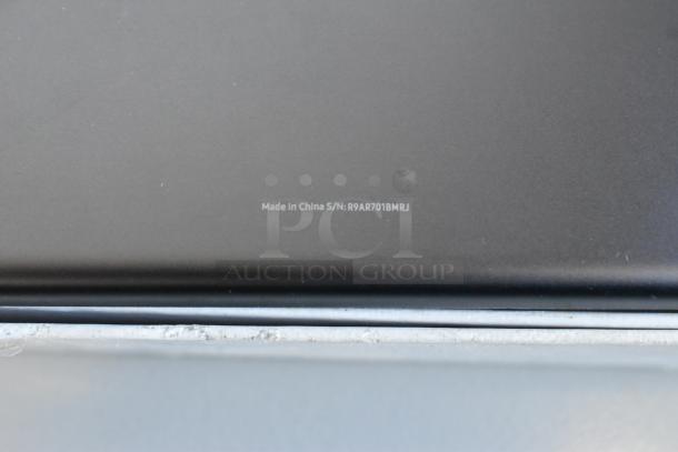 Four assorted tablets, including a Samsung model, in good condition. Serial number visible, made in China.
