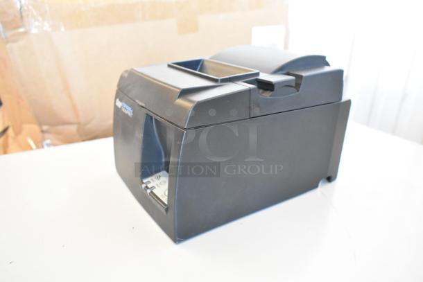 Star TSP100III Receipt Printer, black, with visible logo. Compact, in excellent condition.