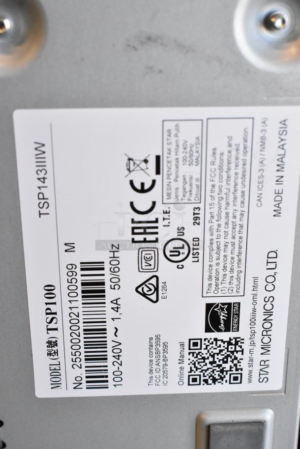 Label on the bottom of a Star TSP100III receipt printer, model TSP143IIIW, showing compliance and manufacturing details.