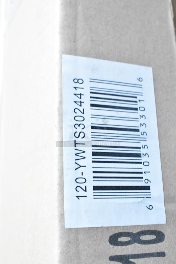 Barcode label showing model number 120-YWTG3024418 for a Yukon Stainless Steel Worktable in original packaging.