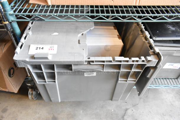 Gray bin containing various items including a StarTech Cantilever Shelf and Avigilon units. Bin labeled "214 QTY VXL."