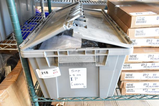 Gray storage bin with "Buckhorn" branding, containing Mobile Mark LTM702 antennas. Labeled as 13 new items for auction.