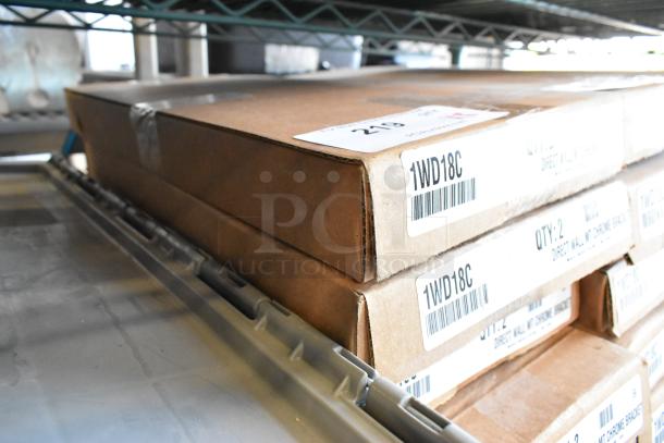 Box with 2 Metro 1WD18C chrome-plated 18" wall mount shelf supports, brand new in packaging, multiple boxes stacked.