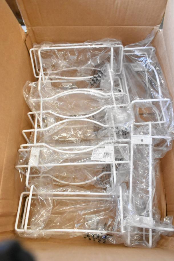Box of brand new Winware WHW-10 glove box holders in original packaging. White metal with visible labeling.