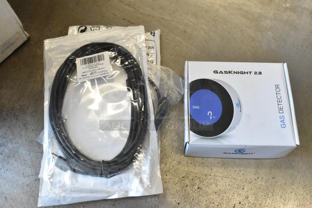 New lot of 4 items, includes Gasknight 2.0 gas detector in box, coiled wires with label "Nylon Braid USB-C," all sealed.