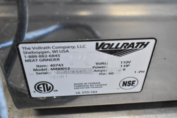 Vollrath MIN0012 40743 stainless steel meat grinder base. 110V, 1 HP, 1 phase. Made in Taiwan. Marked with ETL and NSF logos.