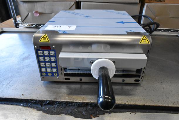 BRAND NEW Prince Castle 464-B toaster, 13-inch stainless steel, single chamber, front loader, 208-240V, 1 phase.