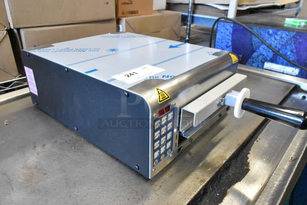 BRAND NEW Prince Castle 464-B 13" toaster, stainless steel, single chamber, 208-240V, front loader, with minor scratches.