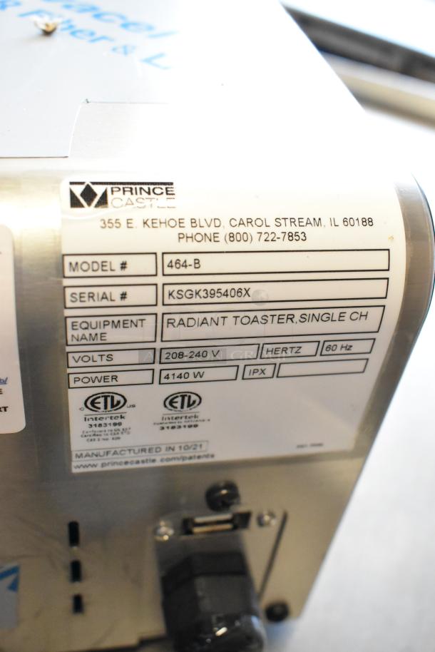 BRAND NEW SCRATCH AND DENT! Prince Castle 464-B stainless steel 13-inch toaster, single chamber, 208-240V, 1 phase.