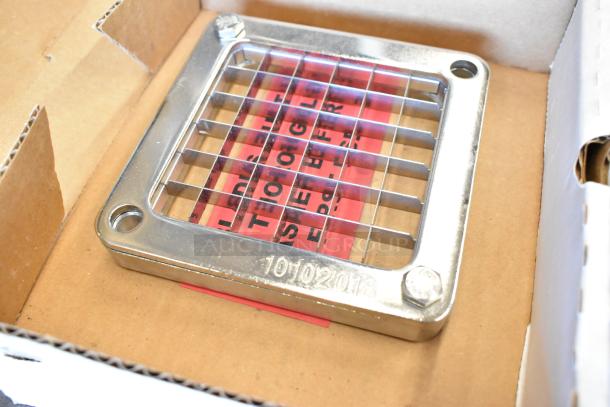 Two brand new 55424-3 vegetable pusher blade in box, stainless steel grid design, engraved with 10102018.