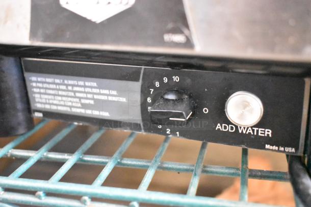 Vollrath Cayenne 1001 stainless steel countertop food warmer, 120 volts, with adjustable dial and "Add Water" indicator.