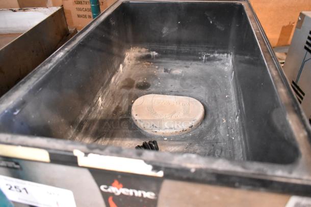 Vollrath Cayenne 1001 stainless steel countertop food warmer, 120 volts, 1 phase, shows signs of use and wear inside.