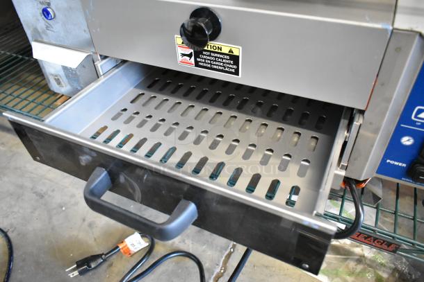Antunes stainless steel commercial countertop steamer with pull-out tray, warning sticker, and visible power cord. Good condition.