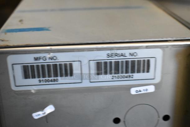Antunes Stainless Steel Commercial Countertop Steamer with visible manufacturing and serial numbers on side panel.