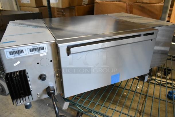 Antunes stainless steel countertop steamer. Features barcode labels with serial 21303497. Appears in good condition.
