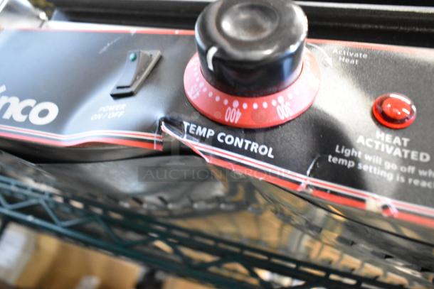 Winco ESG-1 Stainless Steel Panini Press, featuring temp control knob, power switch, and heat indicator. 120 Volts, 1 Phase.