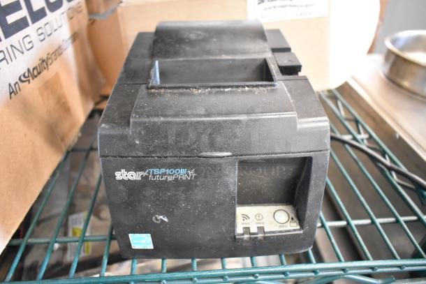 Star TSP100III receipt printer, 100-240V, 1 phase, in used condition, showing minor surface wear and power controls.