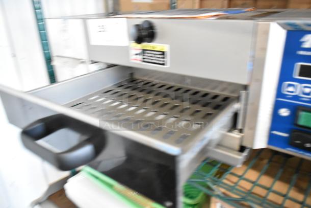 Antunes stainless steel commercial countertop steamer with front handle, visible control panel, and caution label. Excellent condition.