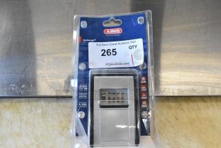 Brand new Abus KeyGarage in original packaging, featuring solid metal housing and resettable 4-dial combination.
