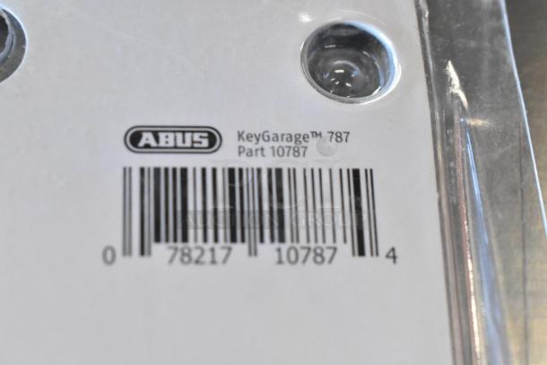 BRAND NEW Abus KeyGarage 787 in original packaging. Part 10787 barcode visible.