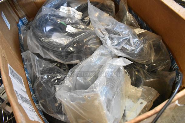 20 new Mobile Mark LTM702-3C3C3J3J3J3J2C-BLK-180 wires in original packaging, labeled with model numbers.