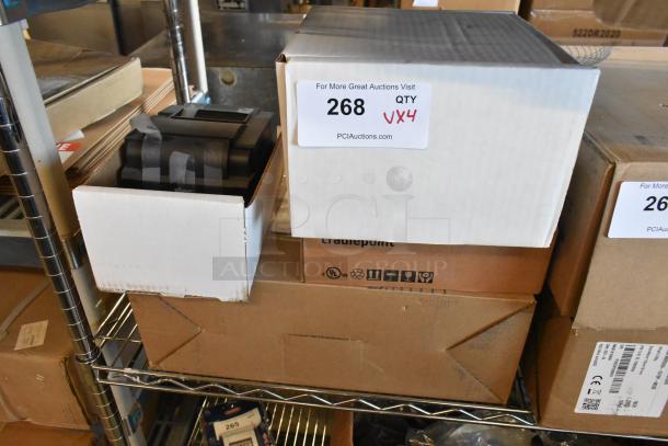 Four brand new items in boxes on a shelf, including Star TSP100III receipt printer, Avigilon camera, and Cradlepoint AER router.