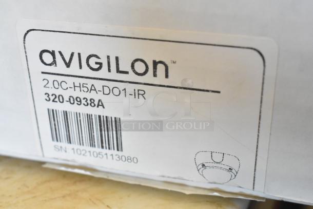 "Avigilon camera box label showing model 2.0C-H5A-DO1-IR, item number 320-0938A, SN 102105113080."