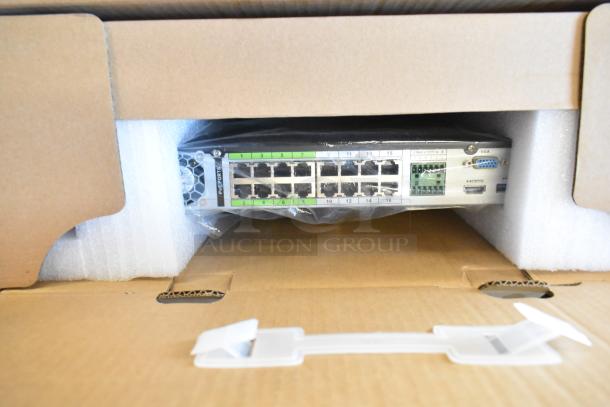 Brand new network equipment box showing Ethernet ports and HDMI, VGA connections, unopened packaging.