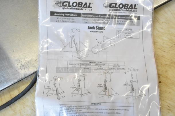 Brand new Global 988870 forklift jack stand, 26,000 lb capacity, detailed assembly instructions, with specs and warning labels.