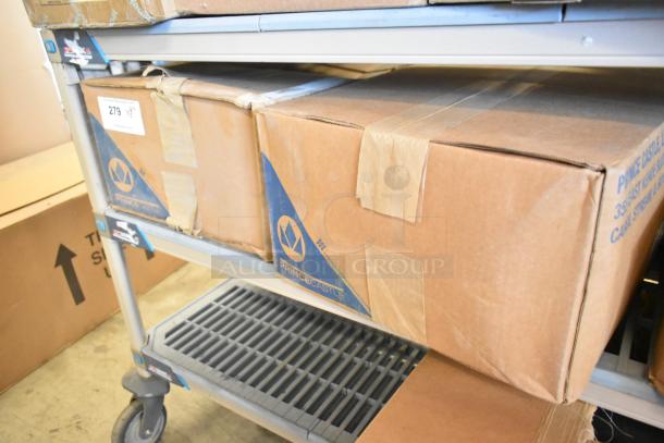 Brand new Prince Castle MHB100HM1-SS heater modules in unopened boxes on a shelf, compatible with MHB100MB warmer.