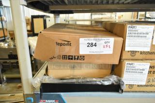 Cradlepoint AER Series Router in original box with auction tag, includes Uline S-23387 Vertical Label Holder. New condition.