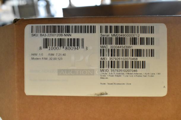 Cradlepoint AER Series Router box with product label showing SKU, serial number, MAC, and IMEI details. Brand new.