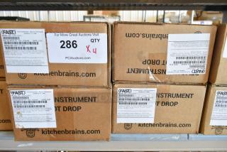 Brand new Fast Z040120HFC timers in original boxes. Visible labels detail model, serial numbers, and auction information.