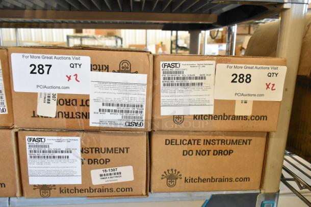 Set of two new Fast Z040120HFC timers in original boxes. Labels state model and serial numbers, indicating boxed contents.