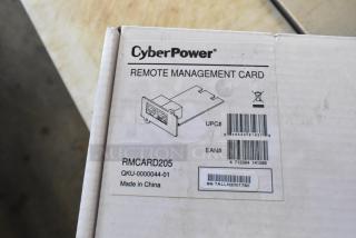 CyberPower Remote Management Card RM CARD205, new in box with serial and UPC labels visible. Model QKU-0000044-01.