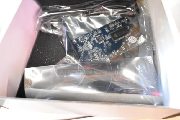 Brand new CyberPower Remote Management Card in box, sealed packaging, includes accessories, quality checked with "OK" label.