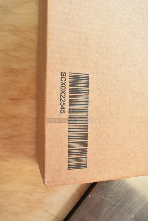 Brand new sealed box including antenna with barcode and number SCX0X22545 visible. Contains two items.