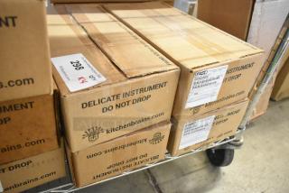 Four boxes of Fast Z040120HFC Timers, new in box, labeled as delicate instruments from Kitchen Brains.