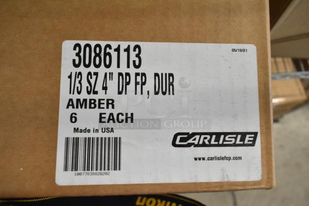 Box of 6 brand new Carlisle 3086113 amber 1/3 size drop-in bins. Made in USA. Label shows product details and barcode.