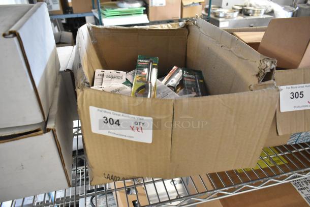 Cardboard box with 21 brand new lighters in packaging, marked "21x" for auction.
