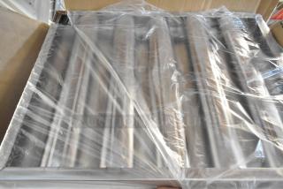 Brand new set of 6 metal grease hood filters in original packaging, pristine condition.