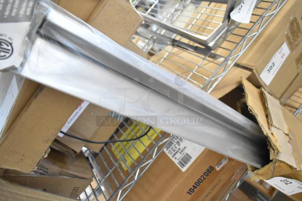 BRAND NEW IN BOX TR36 Ticket Rack 36", stainless steel, in original packaging, pristine condition, ready for use.