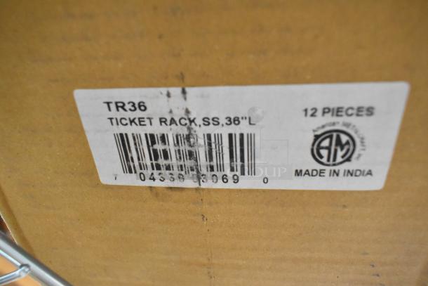 Brand new TR36 36" ticket rack in original box. Label indicates 12 pieces, stainless steel, made in India.