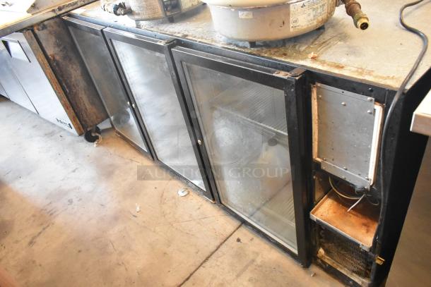 Beverage Air BB72G 3-door back bar cooler, metal frame, glass doors, visible wear, 115V, 1 phase, commercial use.