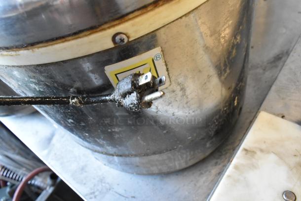 2 Thunder Group metal rice warmers, 120 volts, 1 phase. Visible wear on exterior, power cord attached.