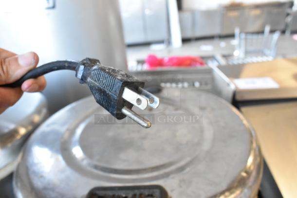 Two Thunder Group metal rice warmers, 120 volts, 1 phase; visible power cord and lid. Slight wear.