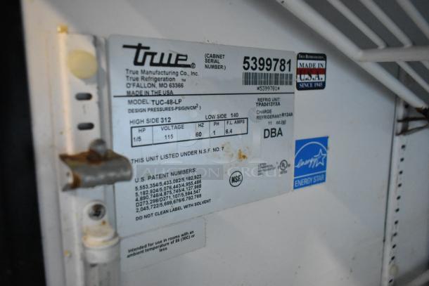 True TUC-48-LP undercounter cooler label detailing model, voltage, and refrigerant info with Energy Star certification.
