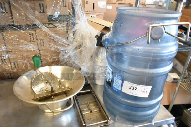 6 kitchen items including San Jamar ice bucket, metal ricer, mandolin slicer, and whipped cream dispensers. Used condition.