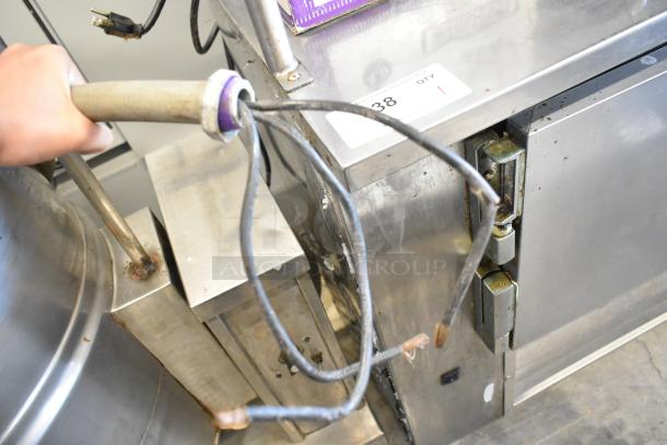 Cleveland KET-20T 20 Gallon Tilting Kettle, stainless steel, electric, visible wiring and use wear, auction label attached.